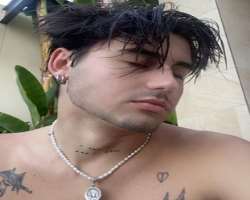 He has piercings in his ears and also loves to wear jewellery like necklaces, rings, and bracelets.